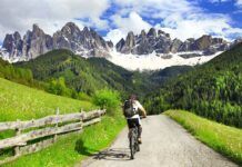 Cycling underneath the Dolomites (c) leoks/ Shutterstock.com